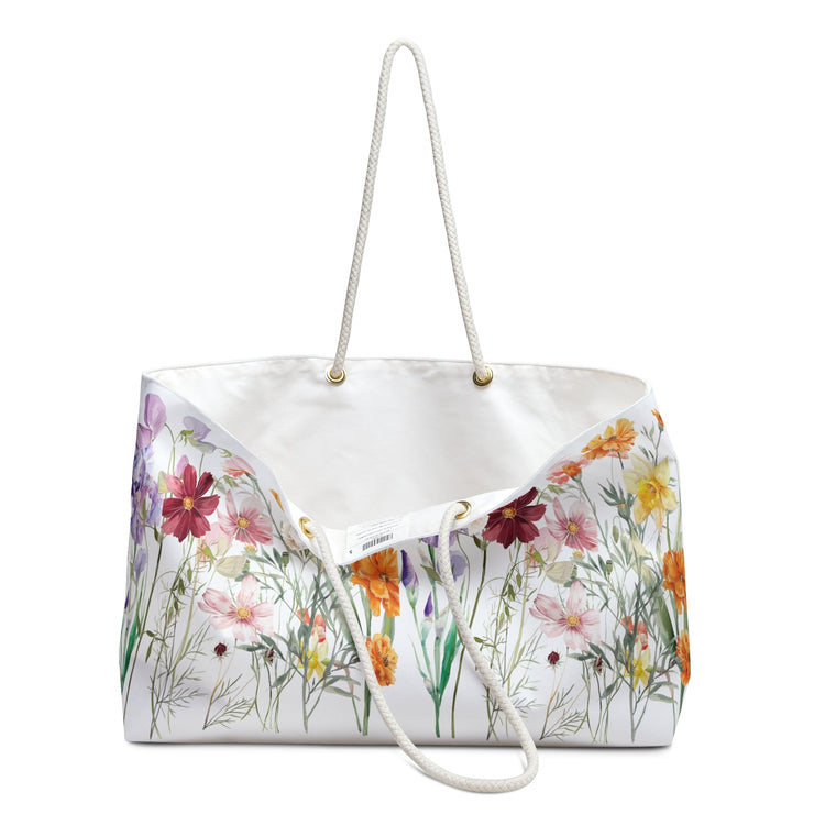 This enchanting floral artwork features a vibrant array of hand-painted wildflowers in shades of red, yellow, purple, and orange, set against a crisp white background.